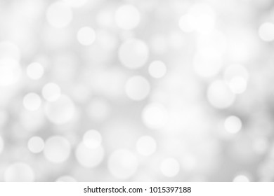 Silver and white bokeh background, texture or backdrop