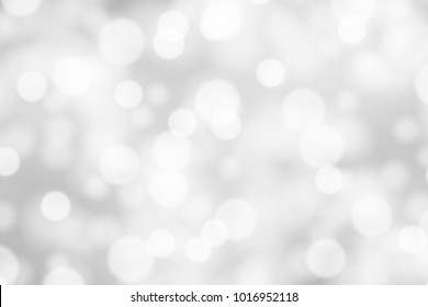 Silver and white bokeh background, texture or backdrop