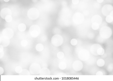 Silver and white bokeh background, texture or backdrop