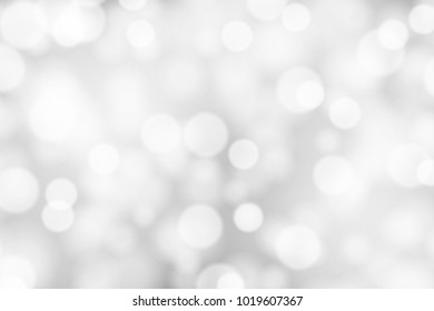 Silver and white bokeh background, texture or backdrop