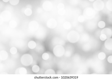 Silver and white bokeh background, texture or backdrop
