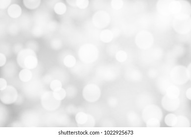 Silver and white bokeh background, texture or backdrop