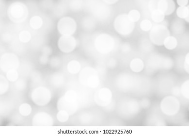 Silver and white bokeh background, texture or backdrop