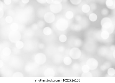 Silver and white bokeh background, texture or backdrop