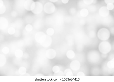 Silver and white bokeh background, texture or backdrop