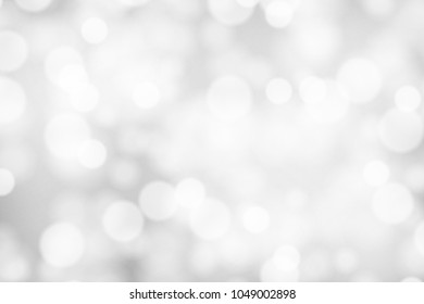 Silver and white bokeh background, texture or backdrop