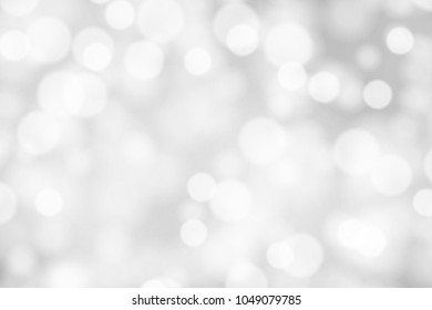 Silver and white bokeh background, texture or backdrop