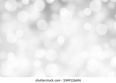 Silver and white bokeh background, texture or backdrop