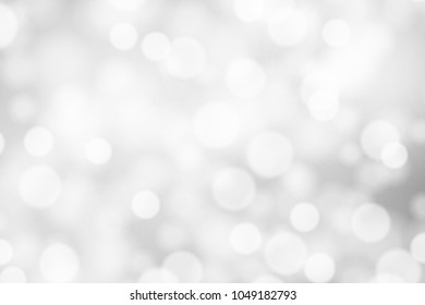 Silver and white bokeh background, texture or backdrop