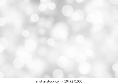 Silver and white bokeh background, texture or backdrop - Shutterstock ID 1049271008