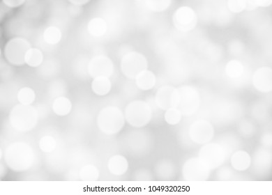 Silver and white bokeh background, texture or backdrop