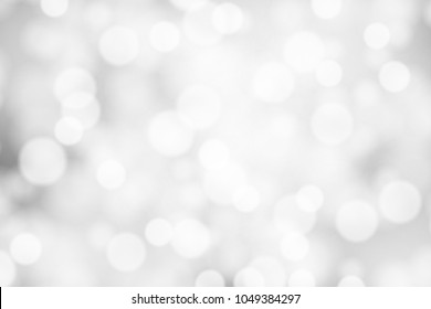 Silver and white bokeh background, texture or backdrop