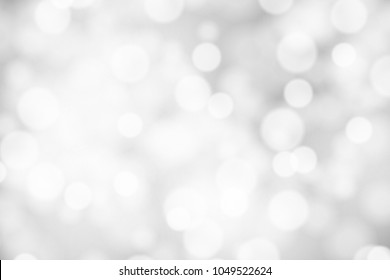 Silver and white bokeh background, texture or backdrop