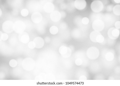 Silver and white bokeh background, texture or backdrop
