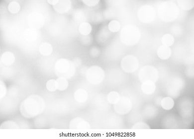 Silver and white bokeh background, texture or backdrop