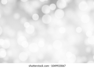 Silver and white bokeh background, texture or backdrop