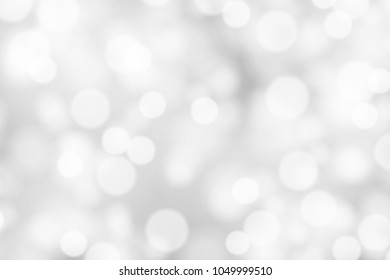Silver and white bokeh background, texture or backdrop