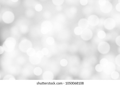 Silver and white bokeh background, texture or backdrop