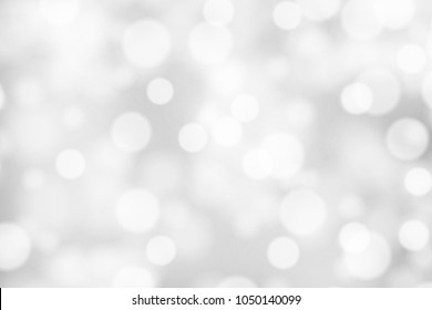Silver and white bokeh background, texture or backdrop