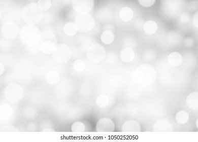 Silver and white bokeh background, texture or backdrop
