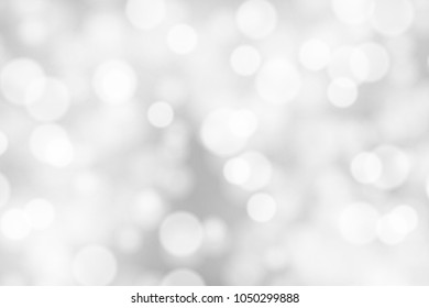 Silver and white bokeh background, texture or backdrop