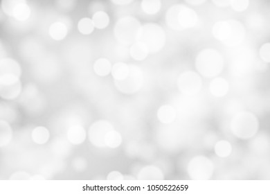 Silver and white bokeh background, texture or backdrop