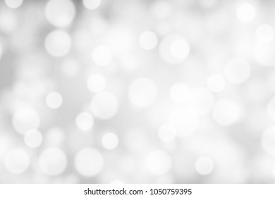 Silver and white bokeh background, texture or backdrop