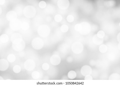 Silver and white bokeh background, texture or backdrop