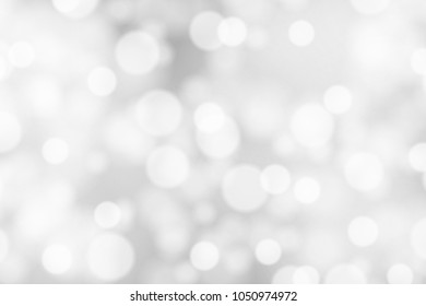 Silver and white bokeh background, texture or backdrop
