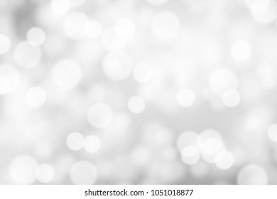 Silver and white bokeh background, texture or backdrop