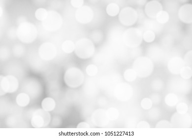 Silver and white bokeh background, texture or backdrop
