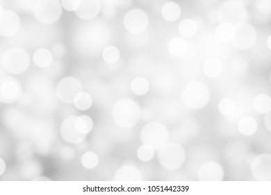 Silver and white bokeh background, texture or backdrop
