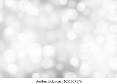 Silver and white bokeh background, texture or backdrop
