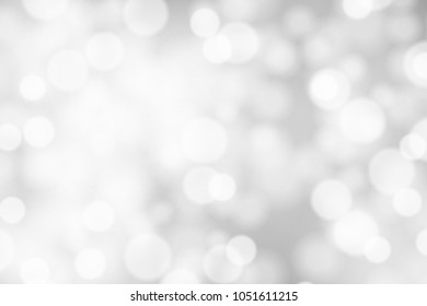 Silver and white bokeh background, texture or backdrop