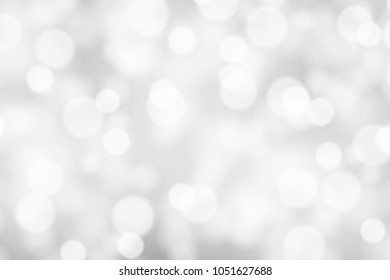 Silver and white bokeh background, texture or backdrop