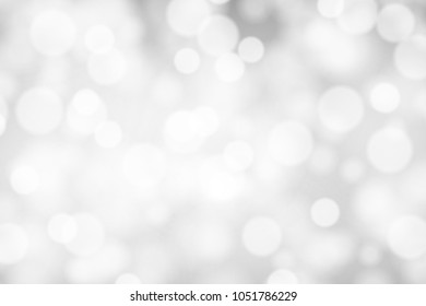 Silver and white bokeh background, texture or backdrop