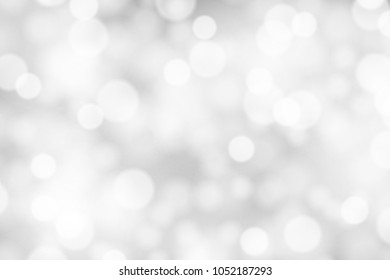 Silver and white bokeh background, texture or backdrop