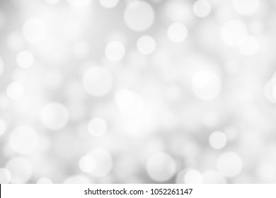 Silver and white bokeh background, texture or backdrop