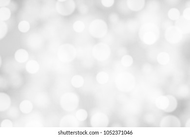 Silver and white bokeh background, texture or backdrop