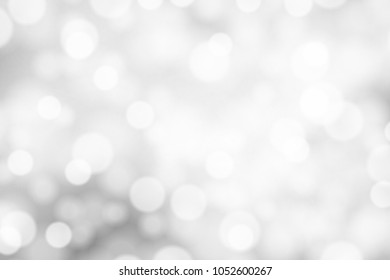 Silver and white bokeh background, texture or backdrop