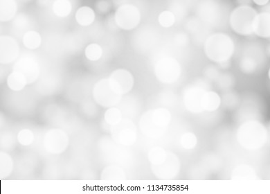 Silver and white bokeh background, texture or backdrop