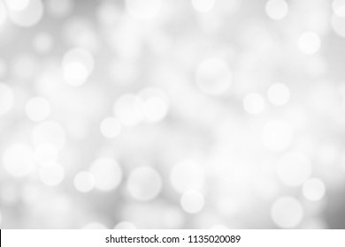 Silver and white bokeh background, texture or backdrop