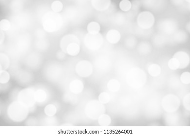 Silver and white bokeh background, texture or backdrop