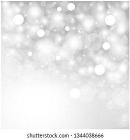 Silver and white bokeh background, texture or backdrop.