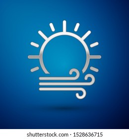 Silver Wind and sun icon isolated on blue background. Windy weather.  Vector Illustration