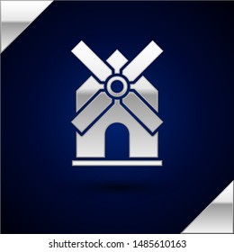 Silver Windmill icon isolated on dark blue background.  Vector Illustration