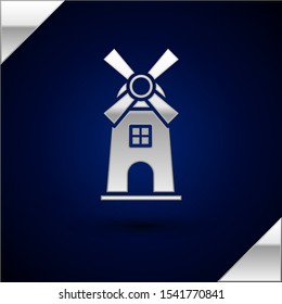 Silver Windmill icon isolated on dark blue background.  Vector Illustration