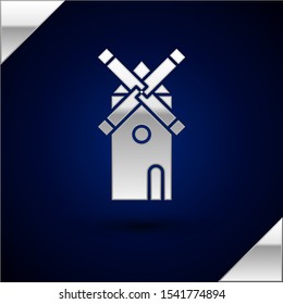 Silver Windmill icon isolated on dark blue background.  Vector Illustration
