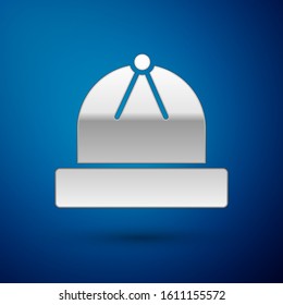 Silver Winter hat icon isolated on blue background.  Vector Illustration