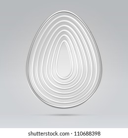 Silver wire glossy concentric ovals hanging over gray background
